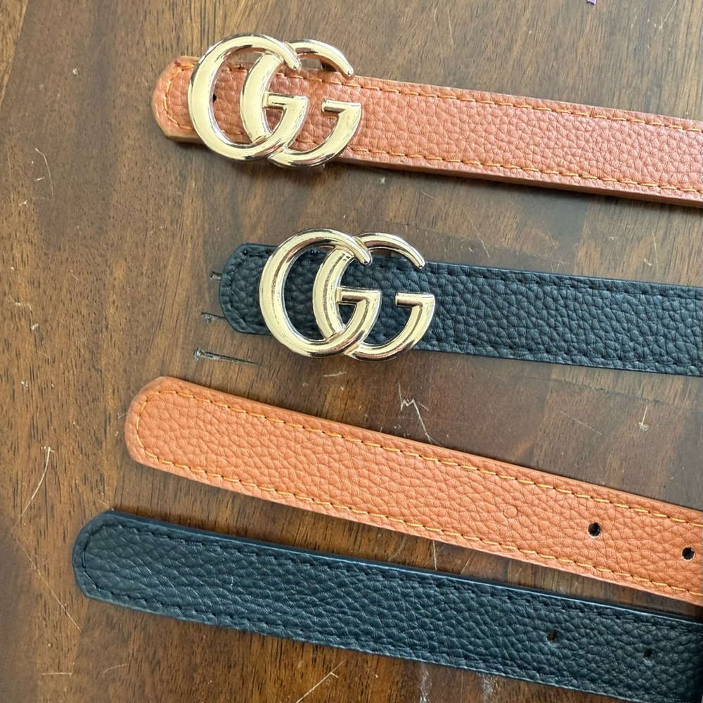 42in brown and black belts. Selling together as a pair.